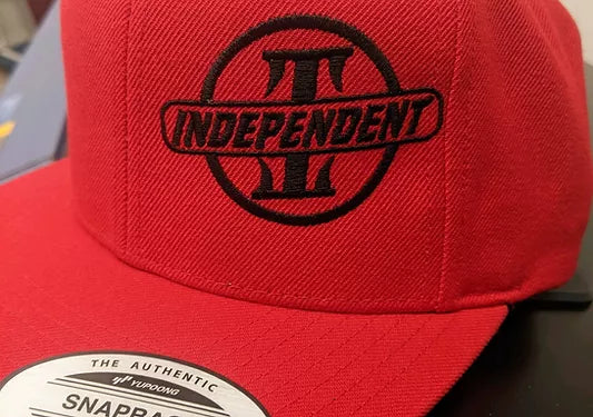 Independent Vinyl & Screen LLC embroidery embroidered red hat with black design thread