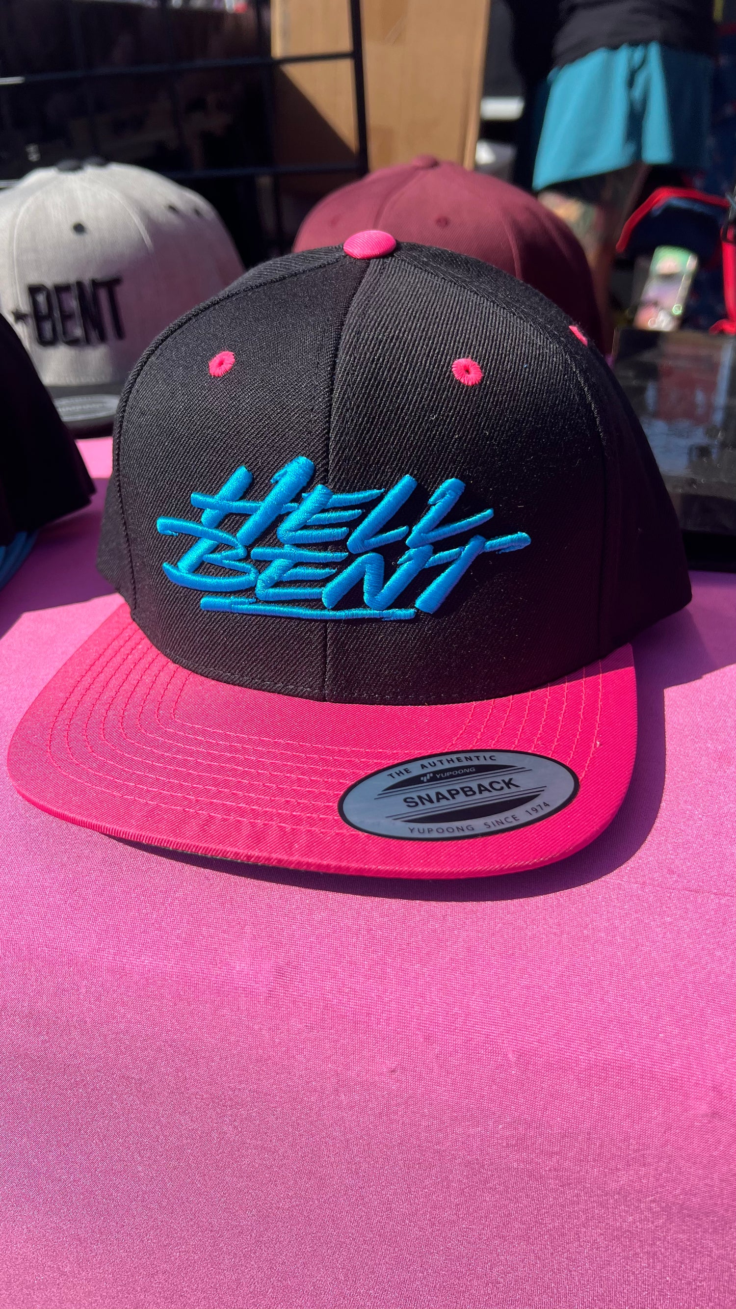 Independent Vinyl and Screen LLC bright embroidered hat using puff vibrant colors Hell Bent